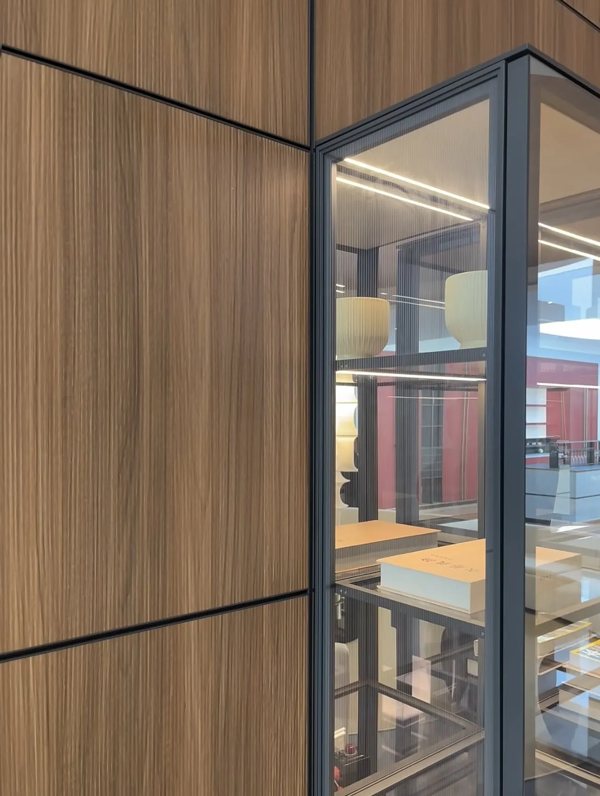Timber panel and glass cabinet corner