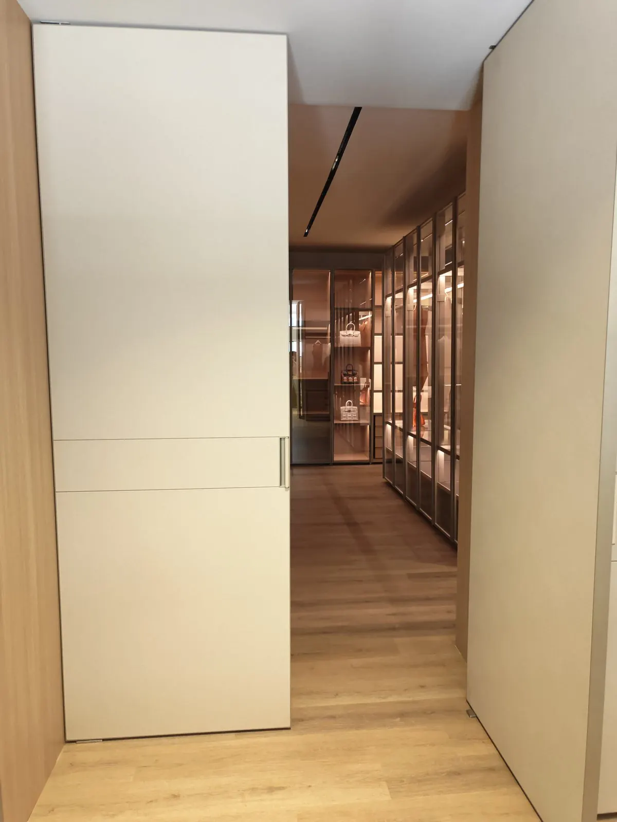 Featured installation: tall pivot door, cream finish
