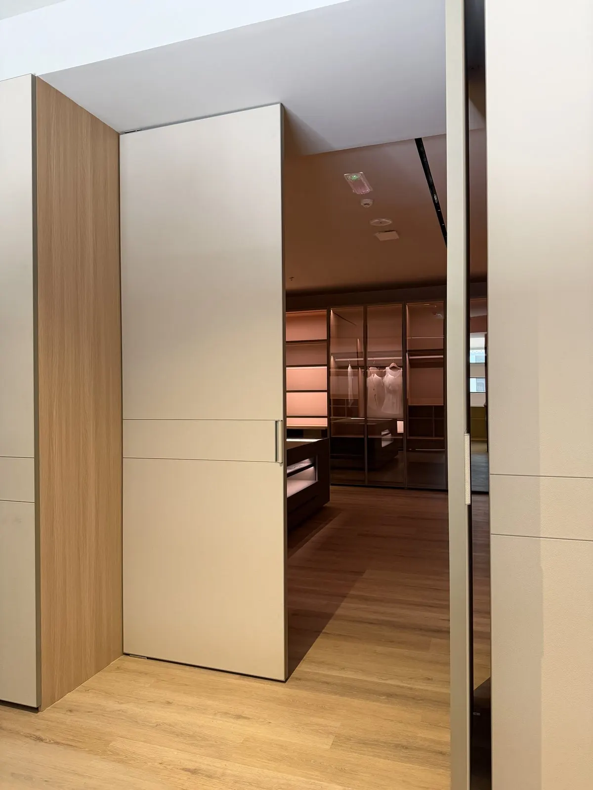 Featured installation: pivot door opening into a walk-in